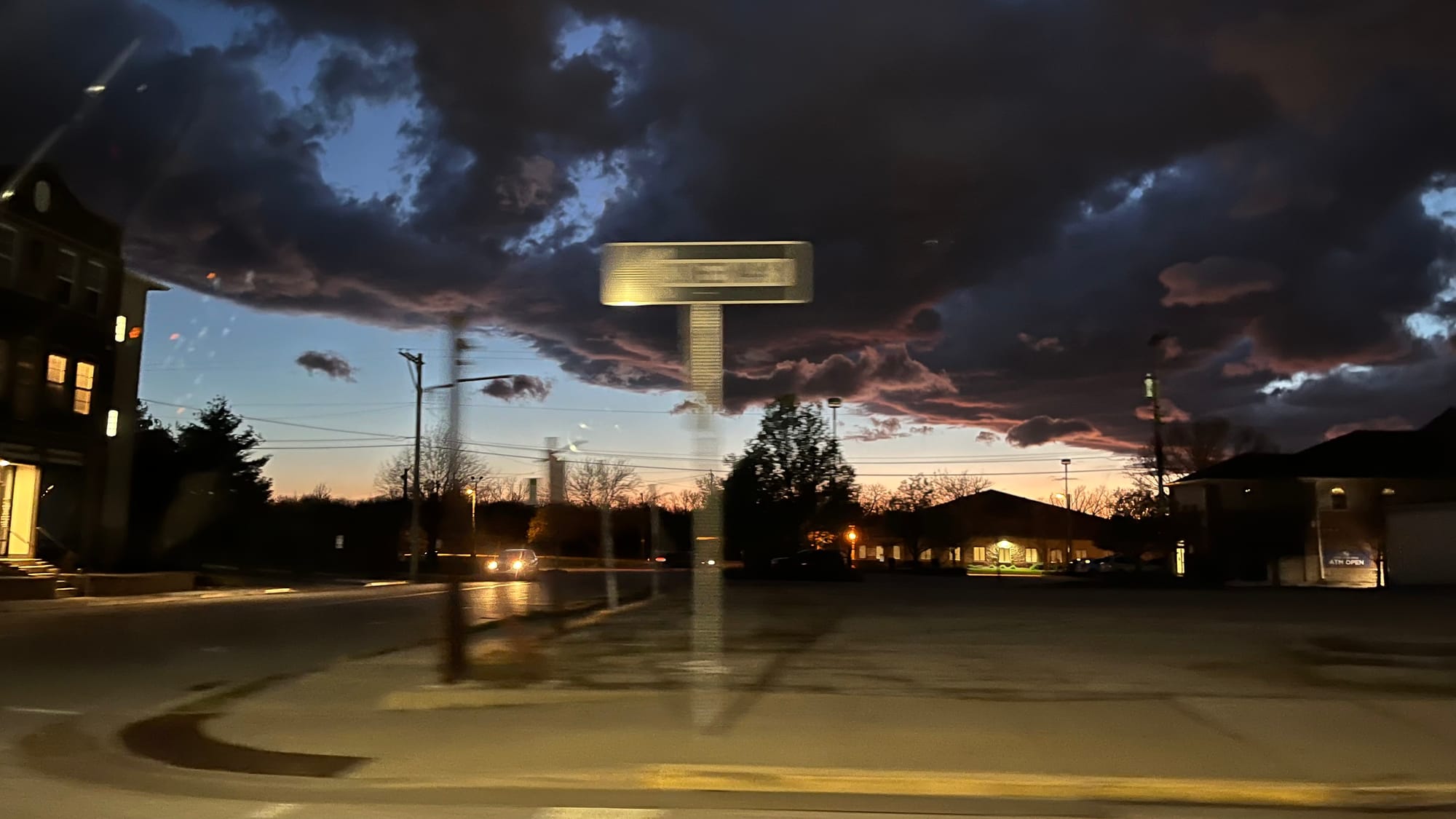 Blurry photo of street at dusk